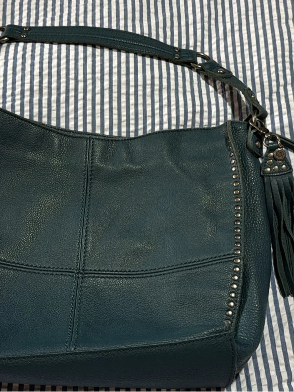The Sak teal pebbled